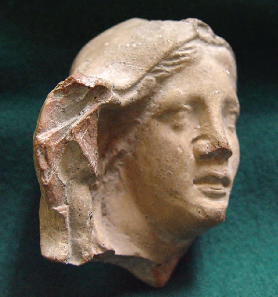 52. Головка Деметры, терракота, рубеж III—II в. до н. э. 52. Головка Деметры, терракота, рубеж III—II в. до н. э.