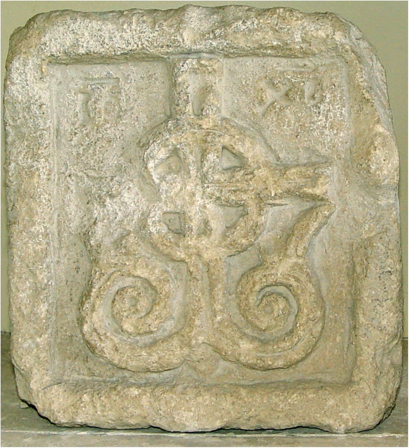 35. Известняковая плита с изображением креста